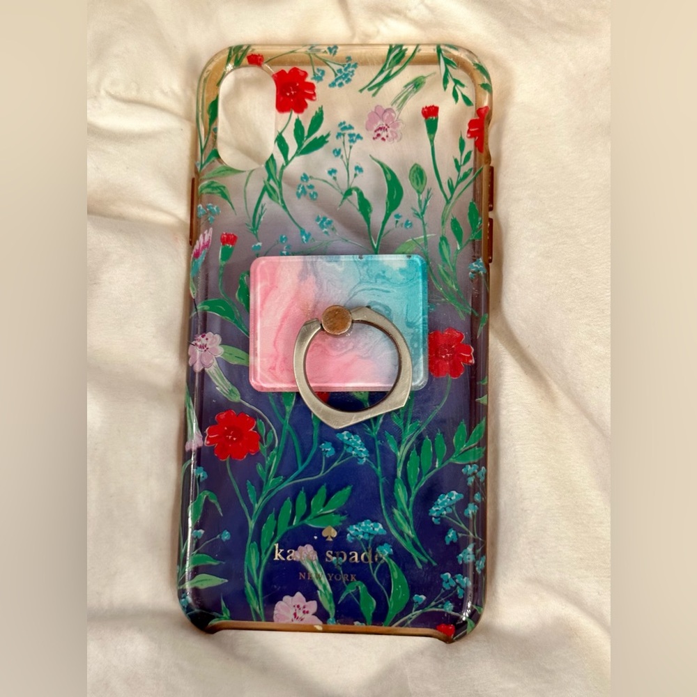 iPhone XS case with phone holder can peel phone holder off for a new one.